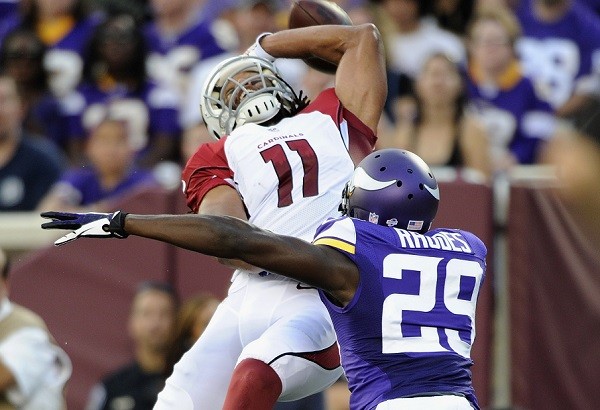 Minnesota Vikings defends against a pass intended for Larry Fitzgerald #11 of the Arizona 