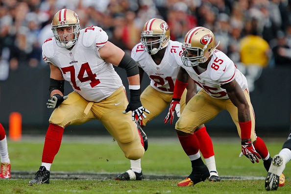 Tackle Joe Staley #74, tight end Vernon Davis #85, and running back Frank Gore #21