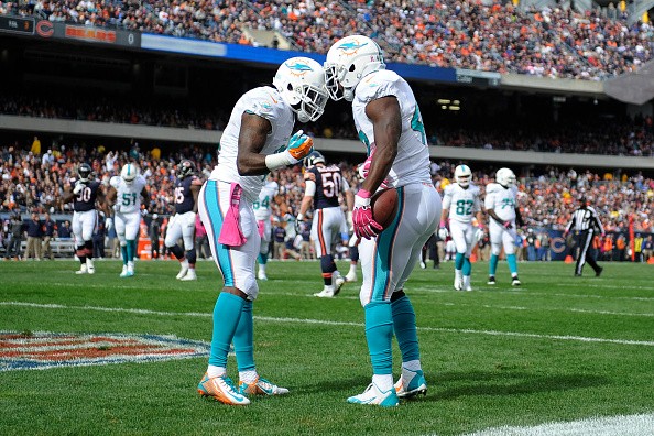 Charles Clay, right, #42 of the Miami Dolphins