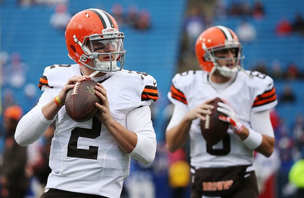 Johnny Manziel #2 of the Cleveland Browns and Brian Hoyer #6 of the Cleveland Browns