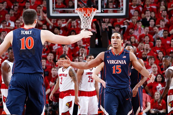 Malcolm Brogdon #15 and Mike Tobey #10