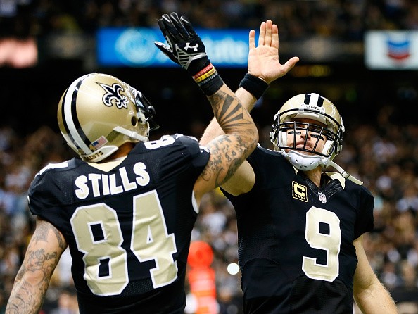 Kenny Stills #84 of the New Orleans Saints and Drew Brees #9