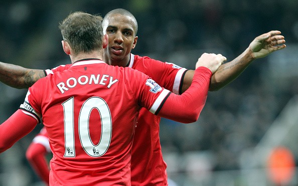Ashley Young of Manchester United (R) celebrates scoring the only goal with Wayne Rooney