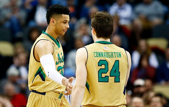 Zach Auguste #30 and Pat Connaughton #24 of the Notre Dame Fighting Irish