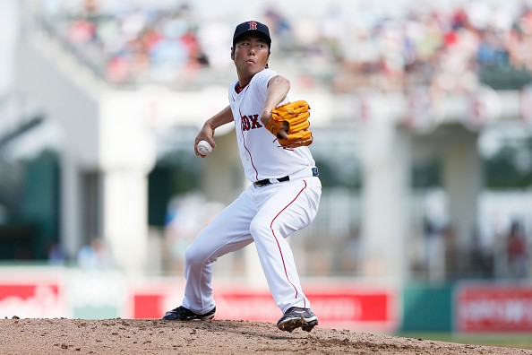 Koji Uehara #19 of the Boston Red Sox pitches