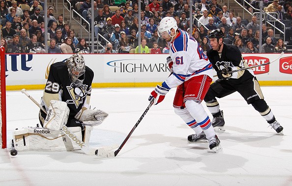 Marc-Andre Fleury #29 of the Pittsburgh Penguins makes a save on a shot by Rick Nash #61