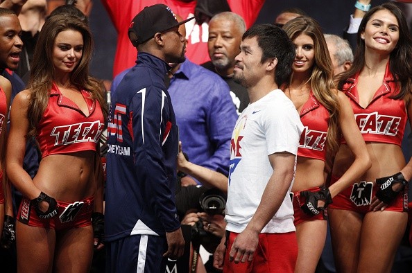 Floyd Mayweather (Center L) and Manny Pacquiao