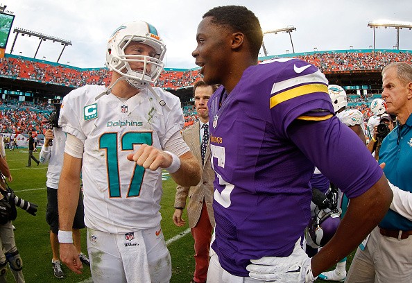 Ryan Tannehill #17 of the Miami Dolphins and Teddy Bridgewater #5 of the Minnesota Vikings 