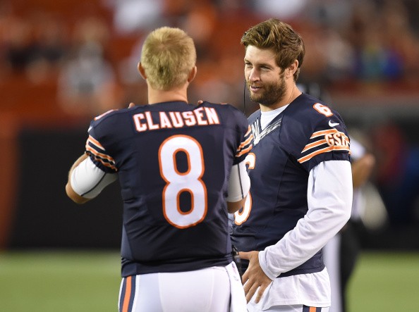 Jay Cutler #6 talks with Jimmy Clausen #8 of the Chicago Bears