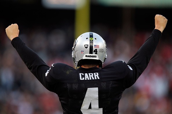 Derek Carr #4 of the Oakland Raiders celebrates 