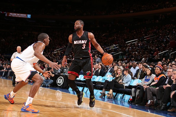 Dwyane Wade #3 of the Miami Heat handles the ball against the New York Knicks