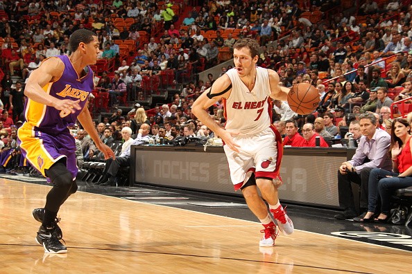 Goran Dragic #7 of the Miami Heat drives to the basket against Jordan Clarkson #6 of the Los Angeles Lakers 