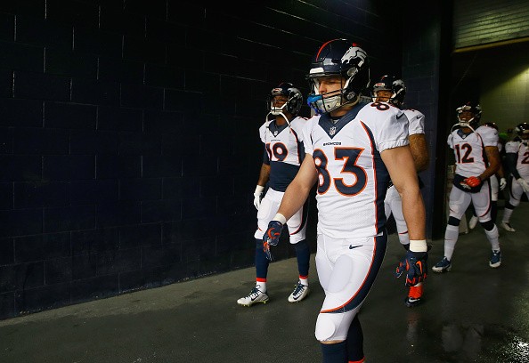 Wes Welker #83 and members of the Denver Broncos