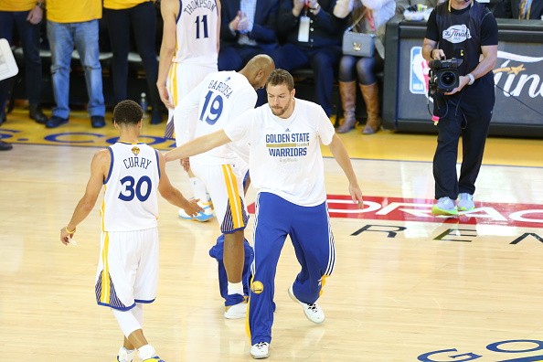 Stephen Curry #30 and David Lee #10 of the Golden State Warriors