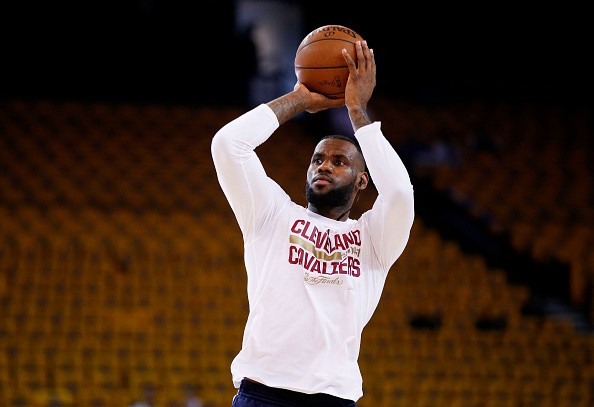 LeBron James #23 of the Cleveland Cavaliers warms up prior to Game Five of the 2015 NBA Finals against the Golden State Warriors