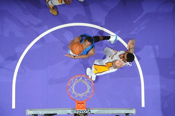 Rajon Rondo #9 of the Dallas Mavericks goes to the basket against the Los Angeles Lakers 