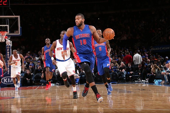Greg Monroe #10 of the Detroit Pistons drives to the basket against the New York Knicks 