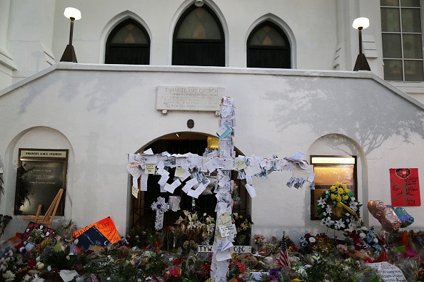  A cross is seen adorned with messages at a memorial in front of the Emanuel African Methodist Episcopal Church 