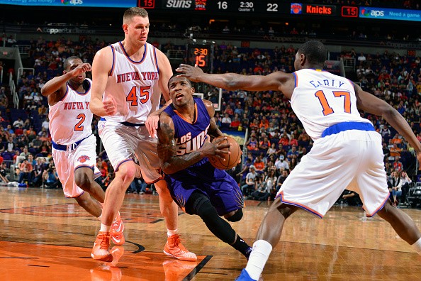 Eric Bledsoe #2 of the Phoenix Suns drives against the New York Knicks