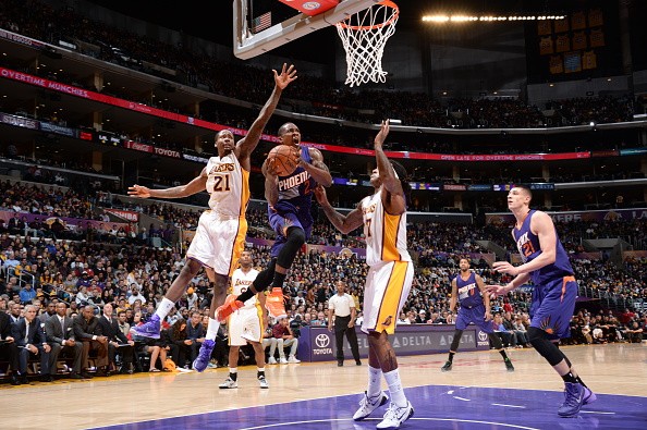 Eric Bledsoe #2 of the Phoenix Suns goes to the basket against the Los Angeles Lakers 