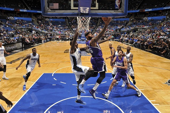 DeMarcus Cousins #15 of the Sacramento Kings goes up for a shot against the Orlando Magic