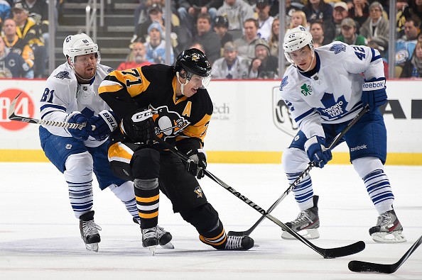 Evgeni Malkin #71 of the Pittsburgh Penguins, Phil Kessel #81 of the Toronto Maple Leafs