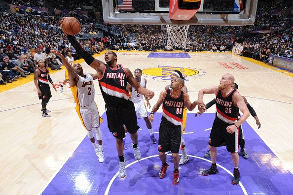 LaMarcus Aldridge #12 of the Portland Trail Blazers grabs the rebound against the Los Angeles Lakers