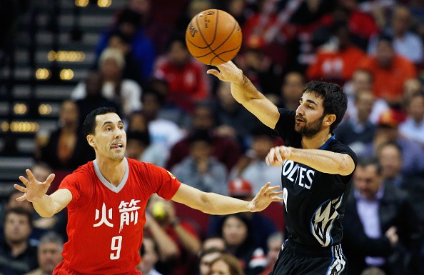 Ricky Rubio #9 of the Minnesota Timberwolves looks to pass the basketball in front of Pablo Prigioni #9 of the Houston Rockets 