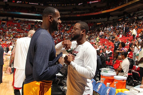 Dwyane Wade #3 of the Miami Heat and LeBron James #23 of the Cleveland Cavaliers 