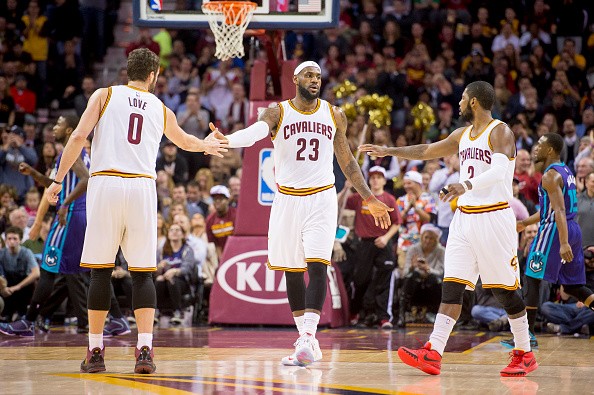 Kevin Love #0 LeBron James #23 and Kyrie Irving #2 of the Cleveland Cavaliers 