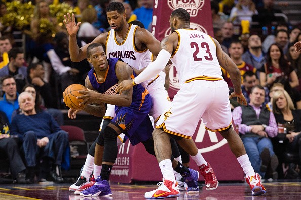 Eric Bledsoe #2 of the Phoenix Suns, Tristan Thompson #13 and LeBron James #23 of the Cleveland Cavaliers 