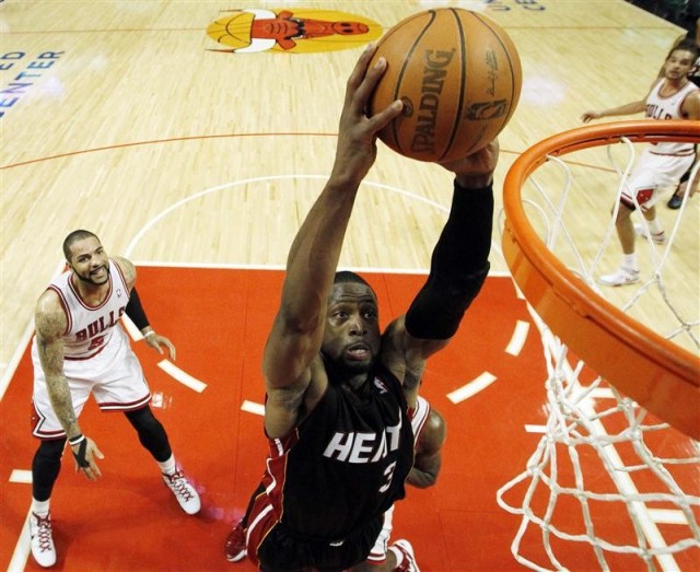 Miami Heat's Dwyane Wade goes to the basket 