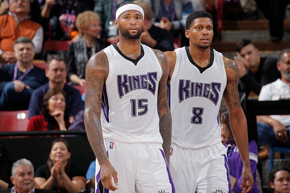 DeMarcus Cousins #15 and Rudy Gay #8 of the Sacramento Kings face off against the Los Angeles Lakers 