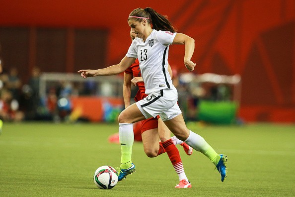 Alex Morgan of USA drives the ball during the FIFA Women's World Cup 2015 semifinal match between USA and Germany 