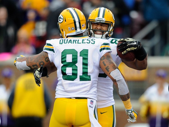 Andrew Quarless #81 of the Green Bay Packers congratulates teammate Richard Rodgers