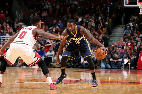 Donald Sloan #15 of the Indiana Pacers handles the ball against Aaron Brooks #0 of the Chicago Bulls