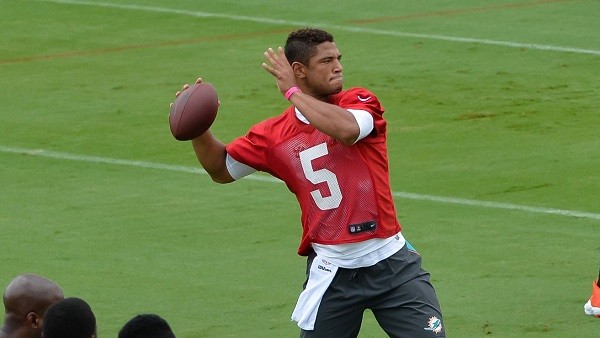 Josh Freeman #5 of the Miami Dolphins throws the ball during the teams first OTA's 