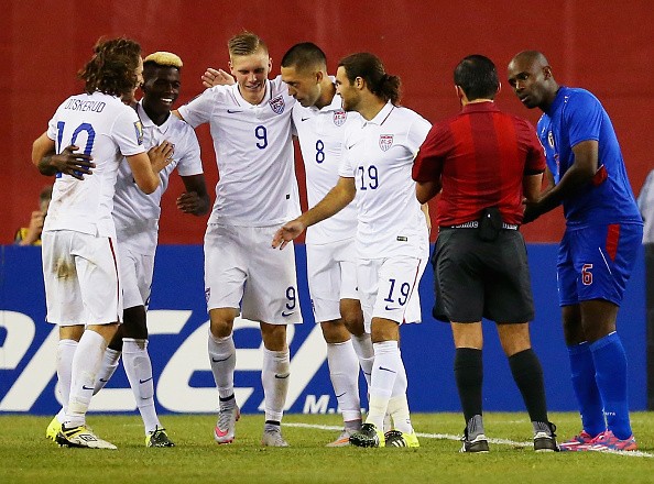 Teammates congratulate Clint Dempsey #8 of United States 