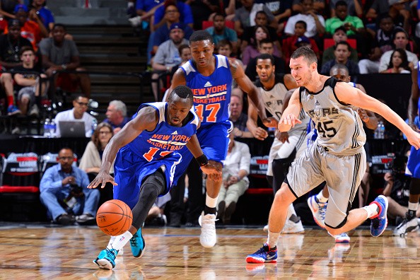Jerian Grant #13 of the New York Knicks dives for the ball against the San Antonio Spurs