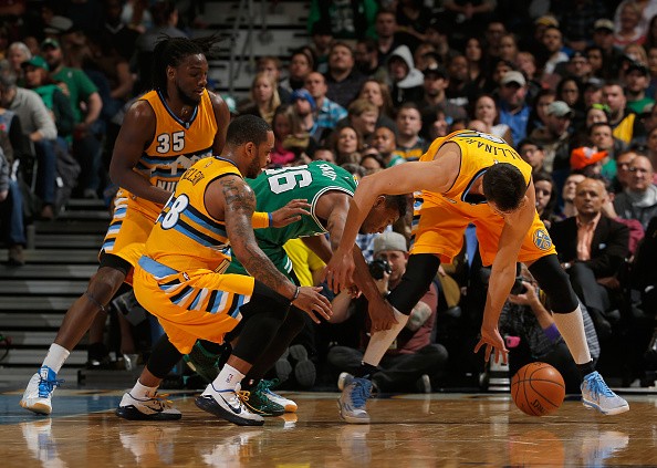 Danilo Gallinari #8 of the Denver Nuggets collects the ball after a turn over by Marcus Smart #36 of the Boston Celtics