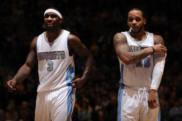 Ty Lawson #3 and Jameer Nelson #28 of the Denver Nuggets 