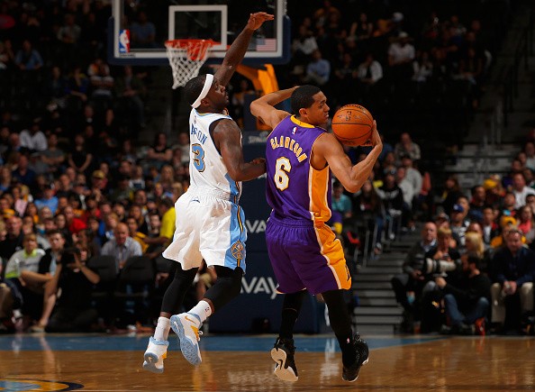 Ty Lawson #3 of the Denver Nuggets and Jordan Clarkson #6 of the Los Angeles Lakers