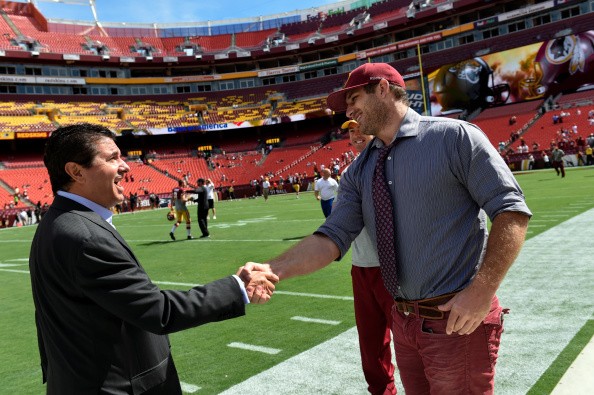 Washington Redskins owner Daniel Snyder congratulates former player Chris Cooley 