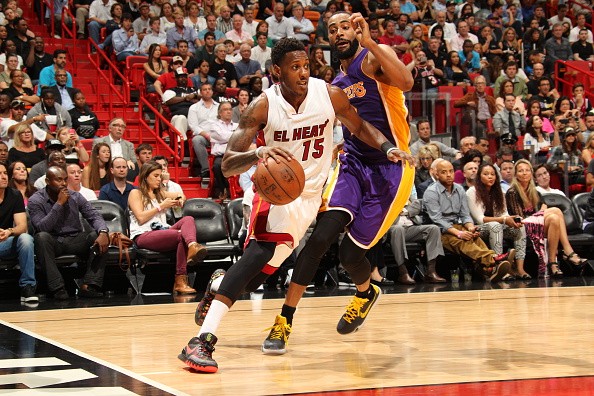 Mario Chalmers #15 of the Miami Heat drives to the basket against the Los Angeles Lakers 