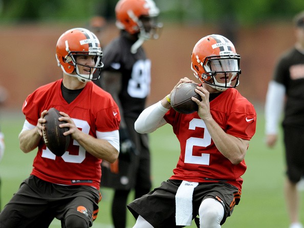 Quarterback Josh McCown #13 and Johnny Manziel #2 of the Cleveland Browns