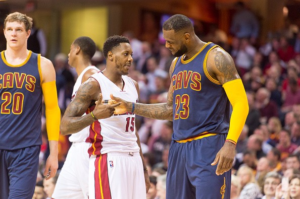 Mario Chalmers #15 of the Miami Heat and LeBron James #23 of the Cleveland Cavaliers