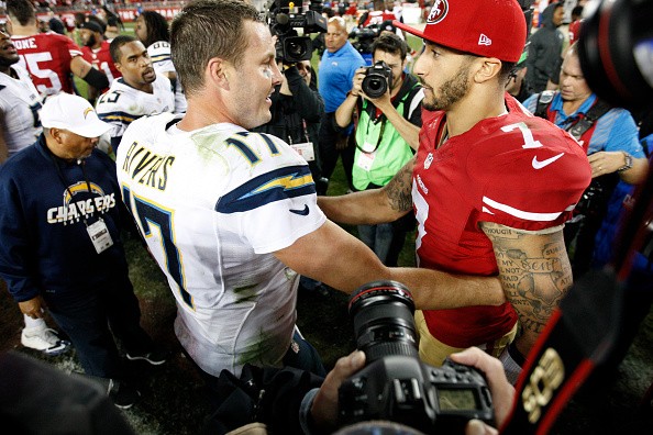 Colin Kaepernick #7 of the San Francisco 49ers and Philip Rivers #17 of the San Diego Chargers 