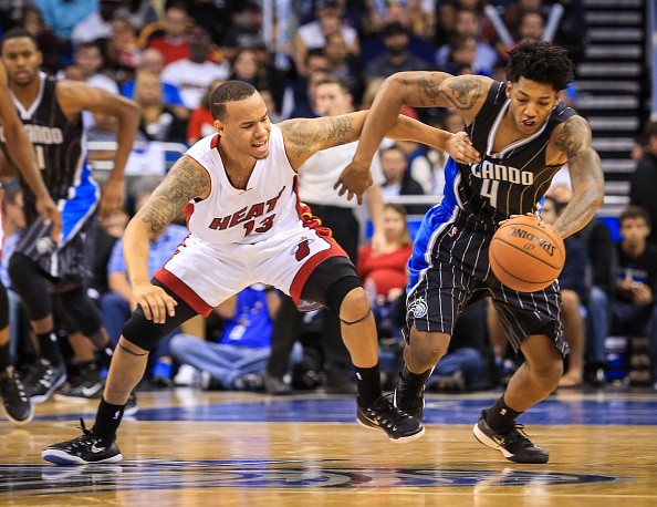 The Orlando Magic's Elfrid Payton (4) steals the ball from the Miami Heat's Shabazz Napier
