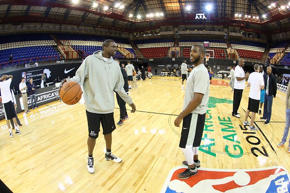 Captain Luol Deng of Team Africa with Captain Chris Paul