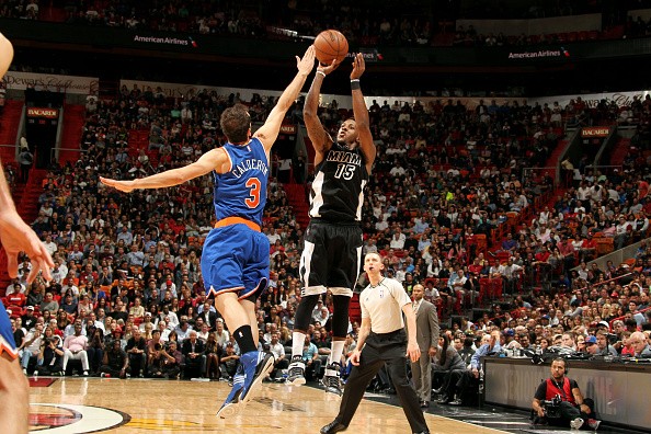 Mario Chalmers #15 of the Miami Heat shoots against the New York Knicks